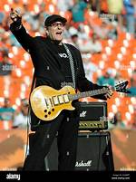 Meet the Legendary Cheap Trick Guitarist: an Unforgettable Musical Journey