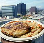 Unveiling the Delights of Delmy's Pupusas: a Culinary Adventure