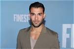 Unveiling the Towering Height of Sam Asghari: Uncover the Insights
